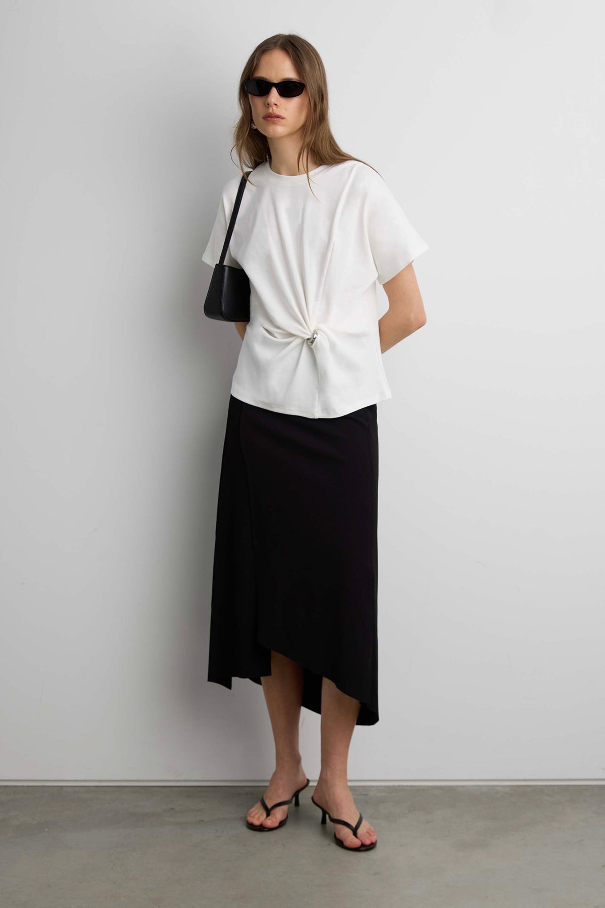ASYMMETRICAL MIDI SKIRT