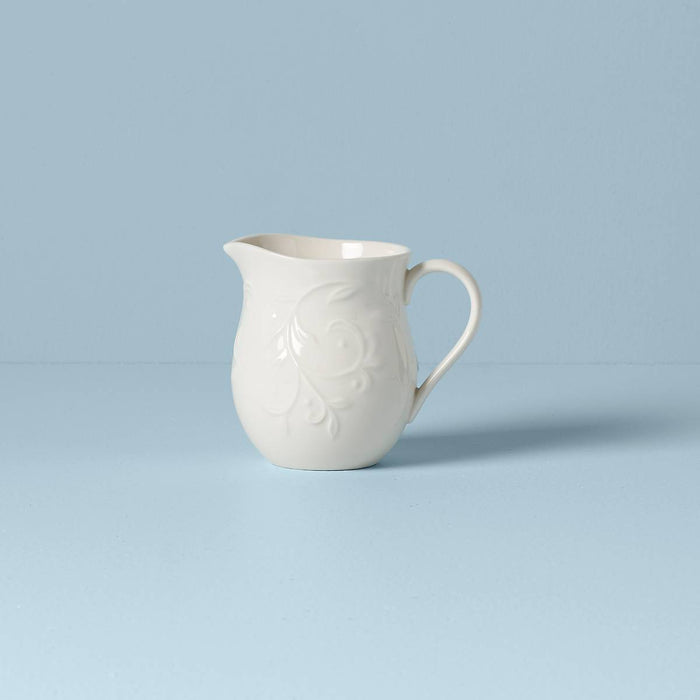 Opal Innocence Carved™ Creamer